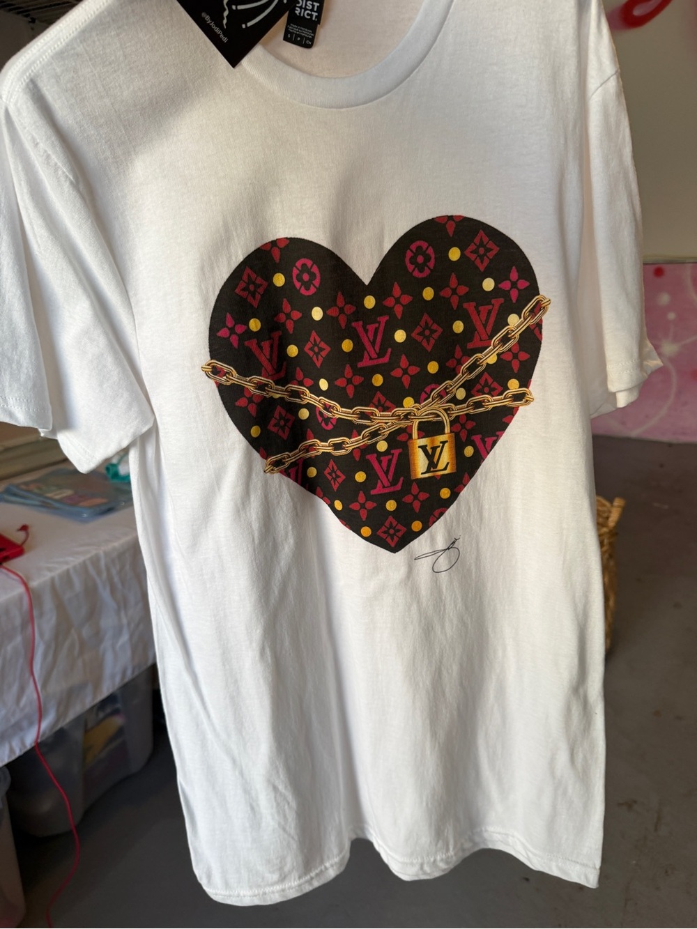District White Tee with Black, Pink, Yellow and Brown Graphic